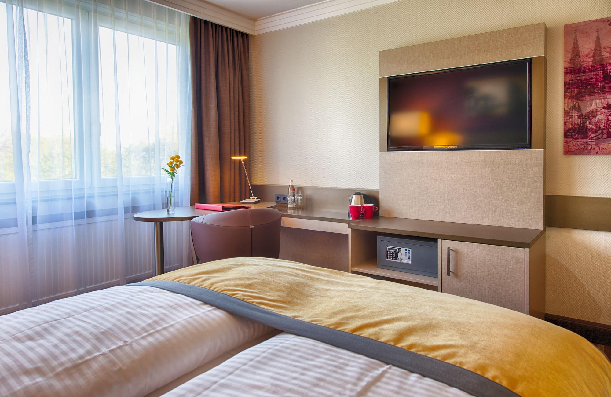 Отель Leonardo Royal - Am Stadtwald 4*